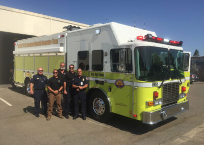Group photo by hazmat vehicle